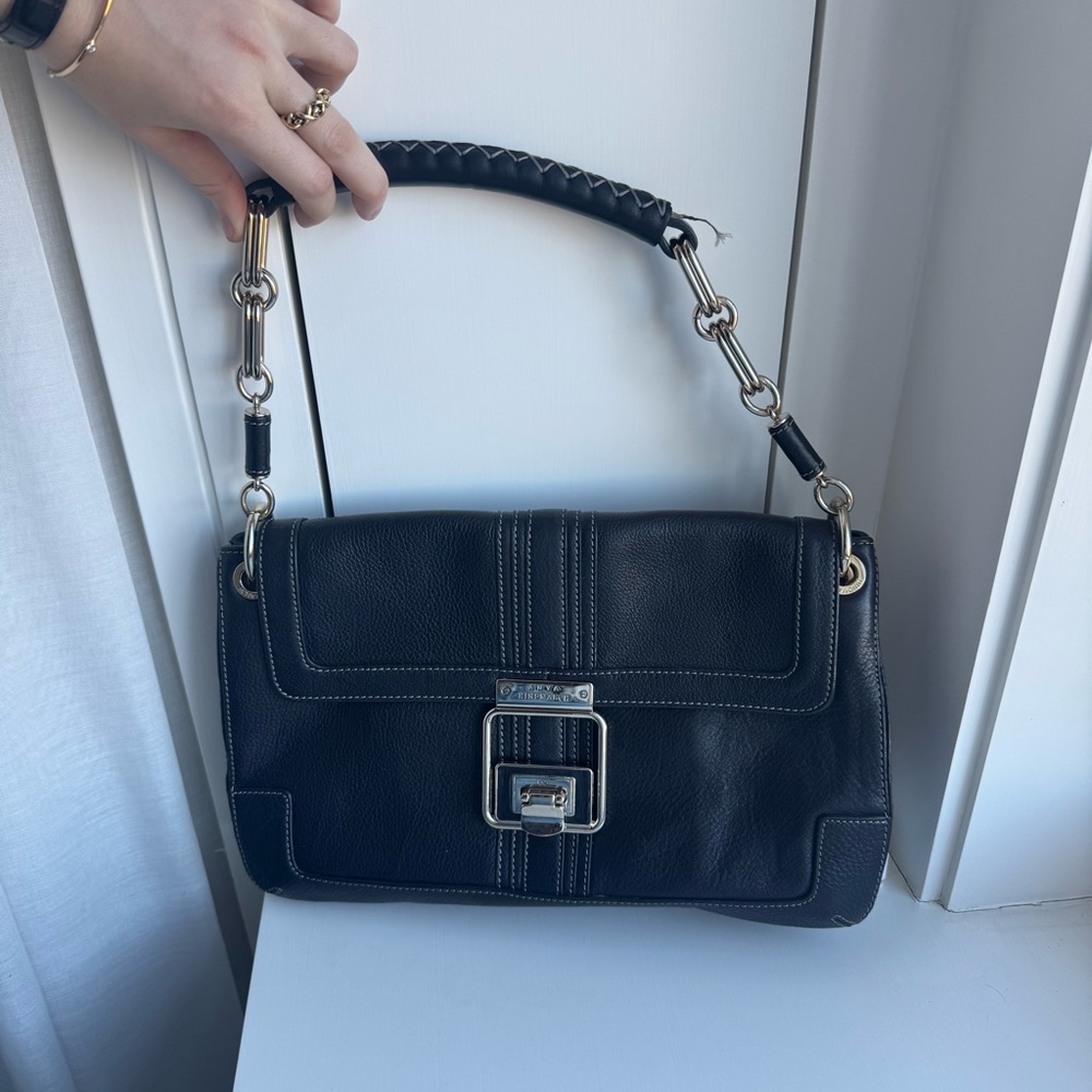 Anya hindmarch black leather shoulder bag with silver chain strap and clasp